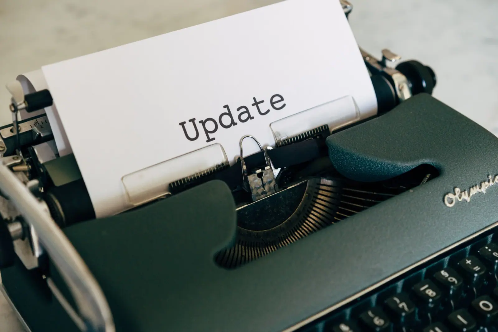 recruitment definition - typewriter with the word 'update' on the page