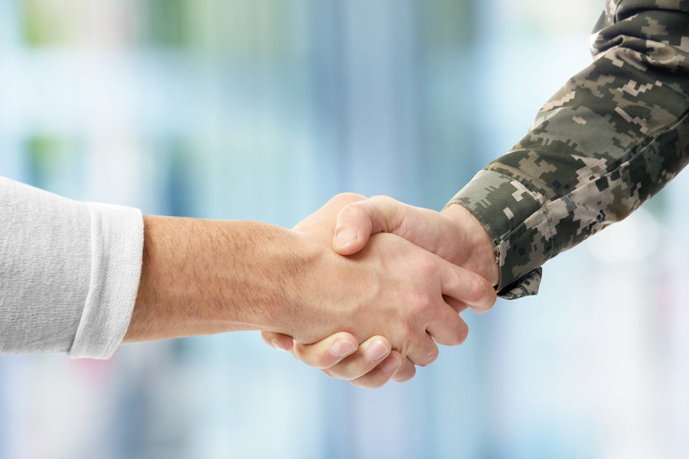 Veteran and Employer Shaking Hands