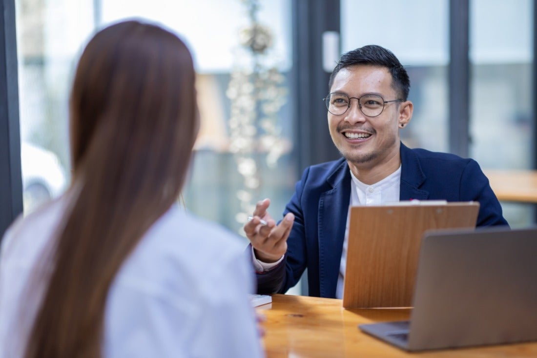 Male HR Professional Engaging Job Candidate During Interview