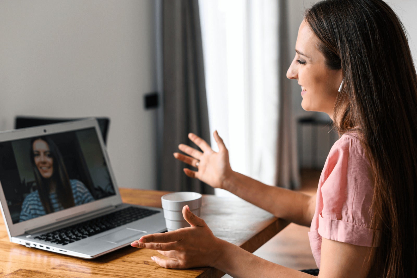 recruiter conducts video interview with remote job candidate
