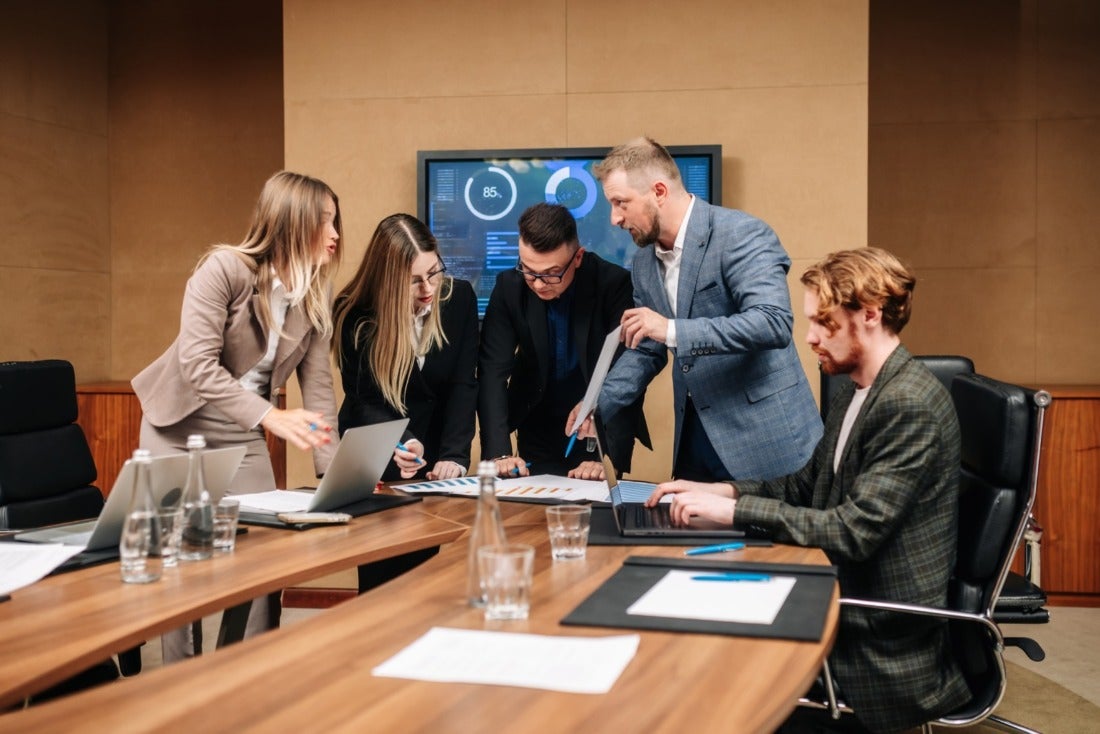 team of professionals planning in a board room