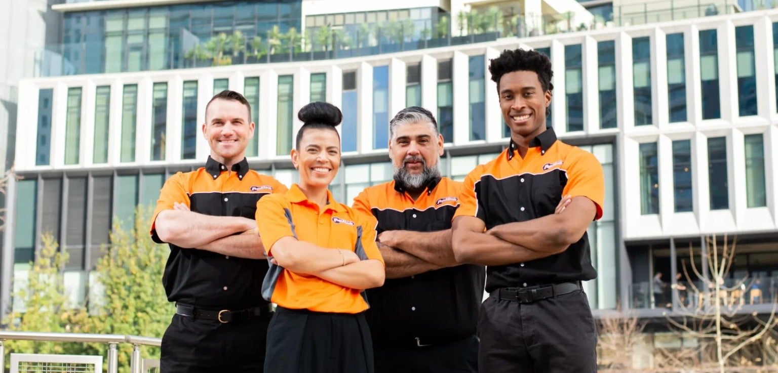 Group of Pop-a-Lock employees standing