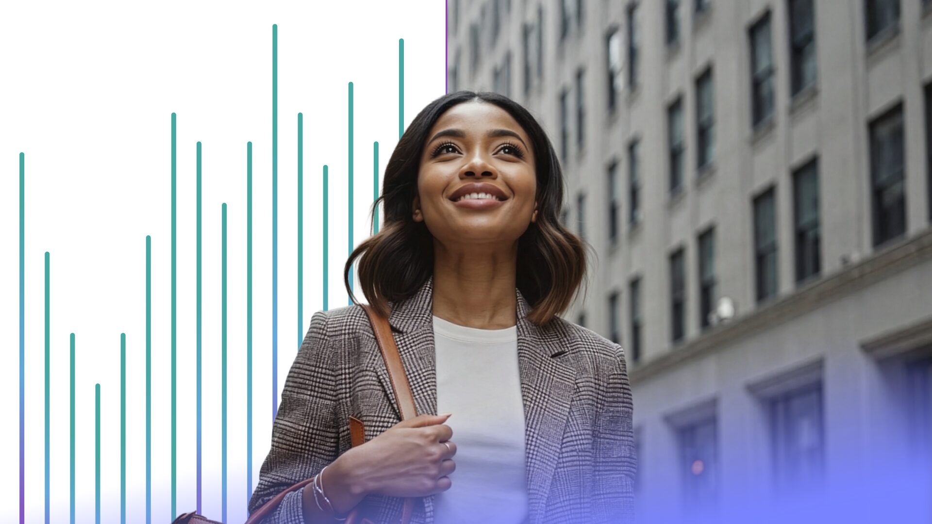 A woman walking down the street in a city, wearing a blazer and carrying a purse, is smiling while looking up at the sky.
